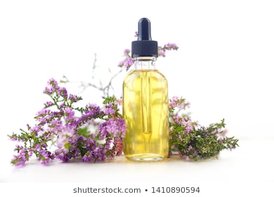 Calluna essential oil in a beautiful bottle on the White background