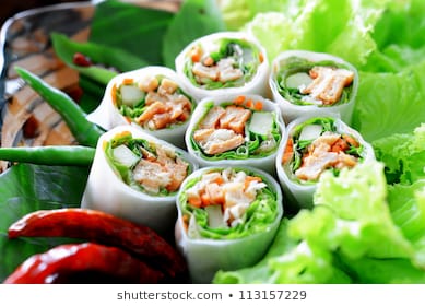 Delicious vietnamese spring roll with vegetable and chili