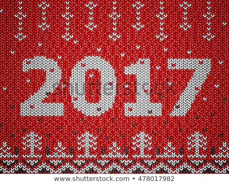 Card of New Year 2017 with knitted texture. Christmas jumper fragment with 2017 New Year. Vector illustration for new years day, christmas, winter holiday, new years eve, knitting, silvester, etc
