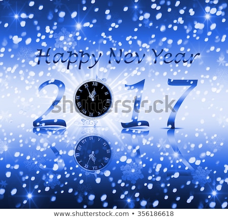 Congratulation happy new year 2017 on a blue background with snow