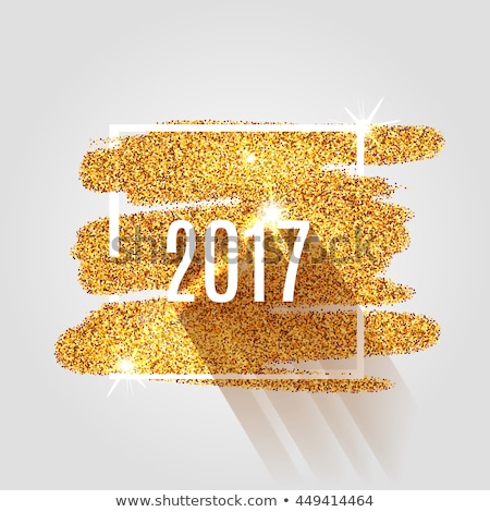 Happy New Year 2017 on the gold paint glitter shine background