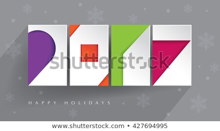 Colorful, contemporary design. Four color blocks with white paper 2017 cut-outs on gray background with long shadow. Happy Holidays. New 2017 year. Illustration.