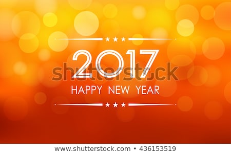 happy new year 2017 with bokeh and lens flare pattern on summer orange color background (vector)