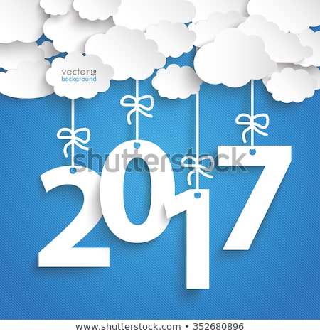 Paper clouds with text 2017 on the blue background. Eps 10 vector file.